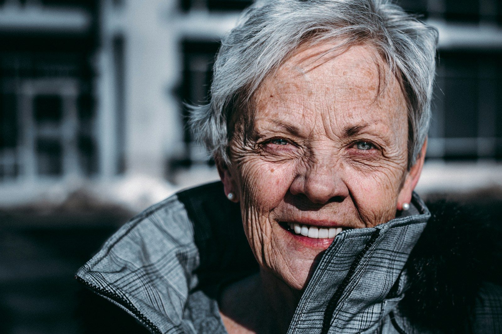 Stock photo of a smiling older adult. Model is not a client of this center.